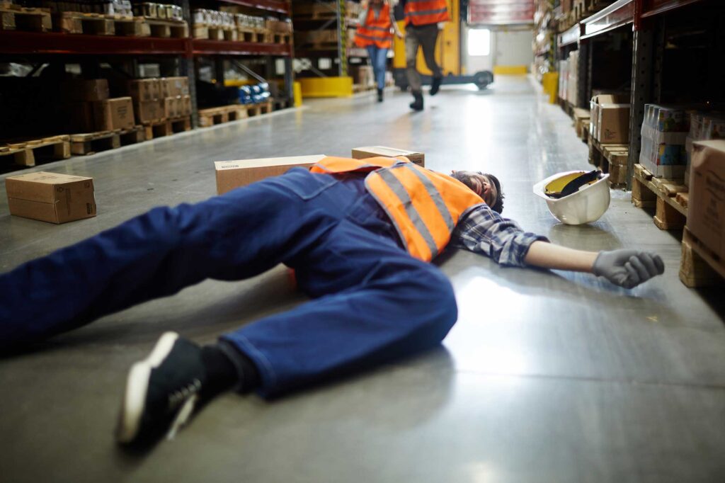 Worker injured at work from a slip and fall personal injury.