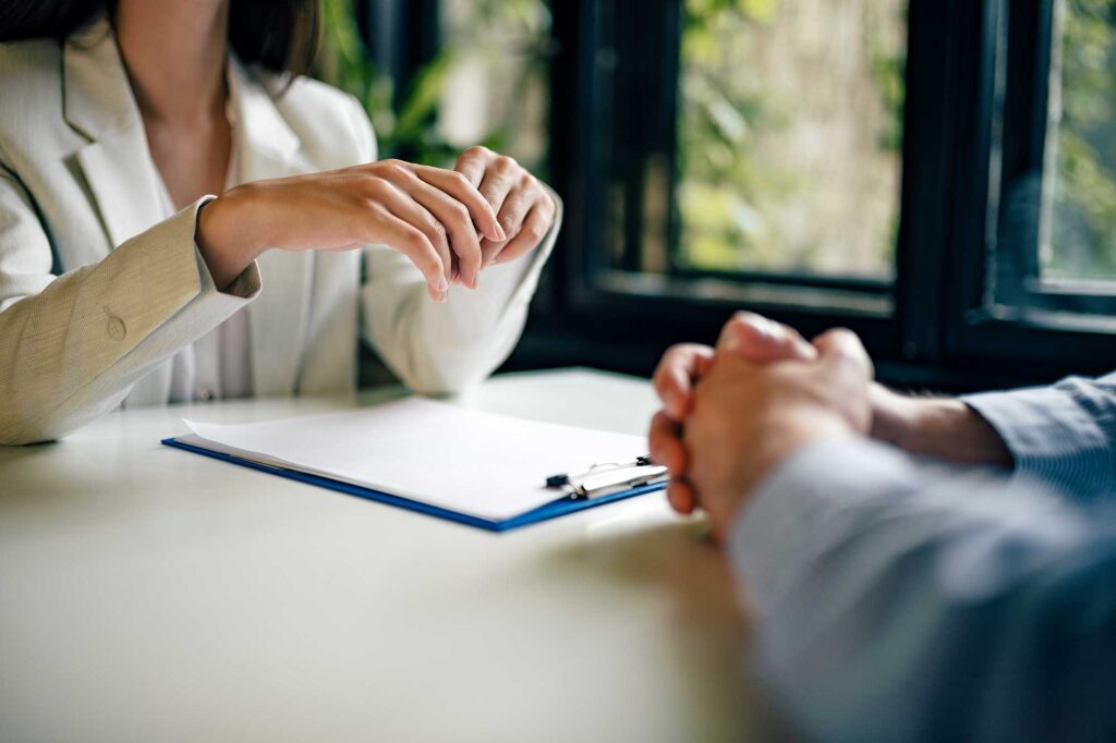 A woman in Georgia meeting with a personal injury attorney.