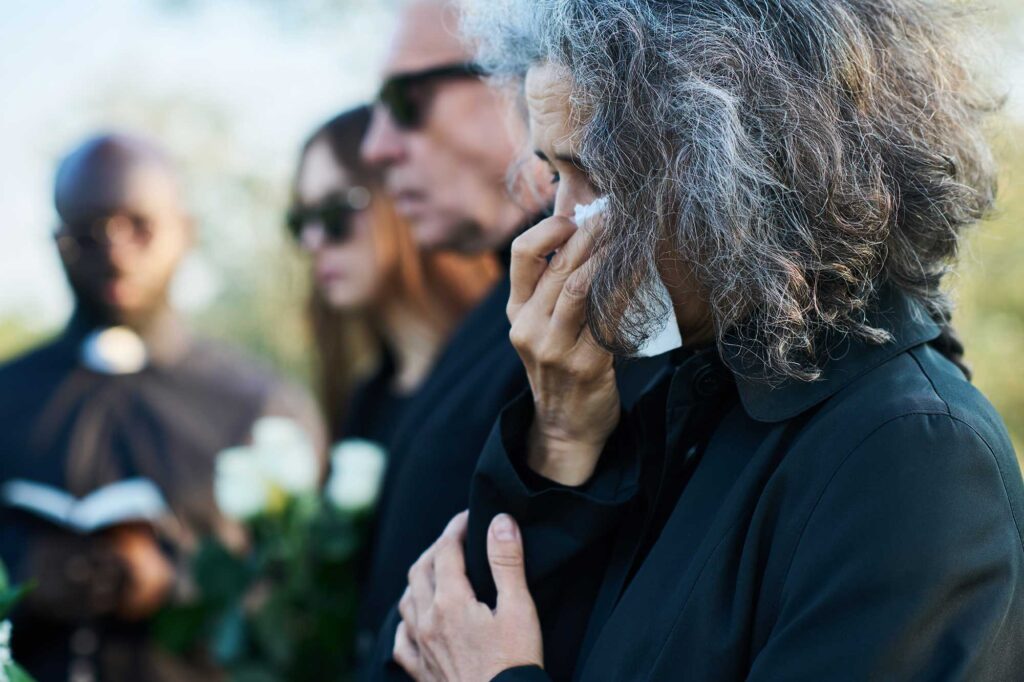 Woman grieving after a wrongful death.